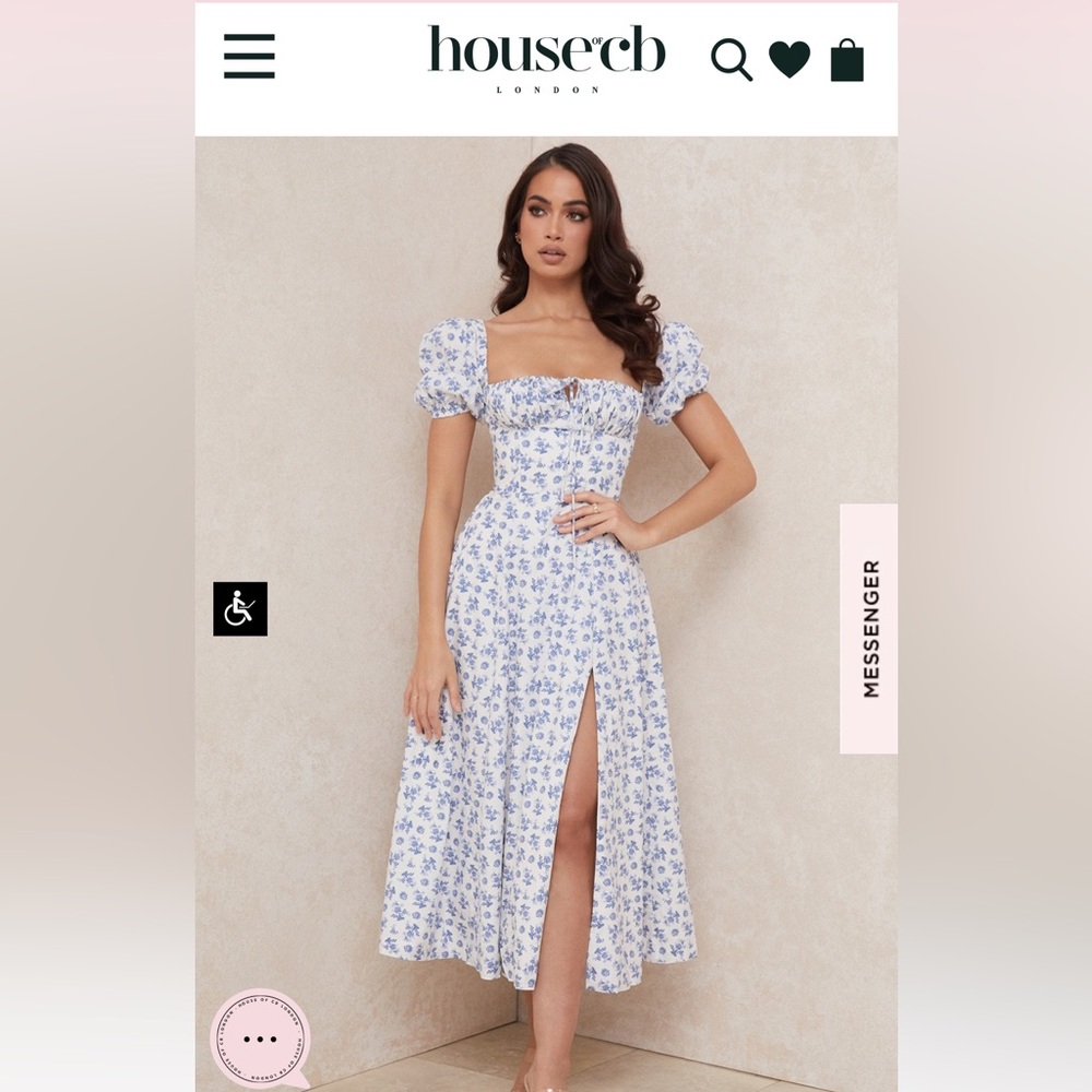 House of cb Talulah dress in white with blue floras. Worn once no stains.